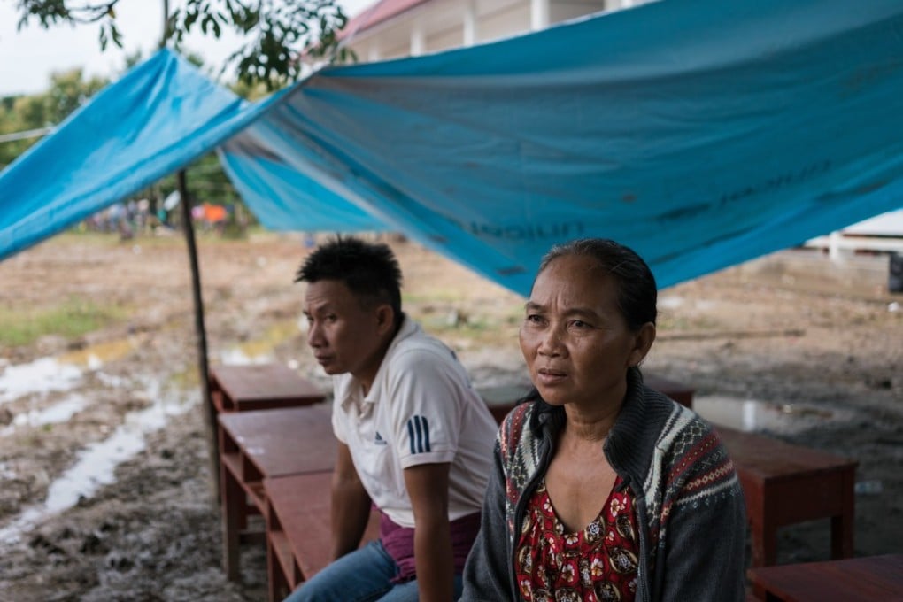 Vee Keoheuy and her husband at the Sanamxai rescue base. Pictures: Thomas Cristofoletti