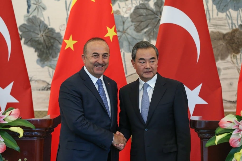 Turkish foreign minister Mevlut Cavusoglu told Chinese counterpart Wang Yi this month his country promised to treat security threats to China as threats to itself. Photo: EPA