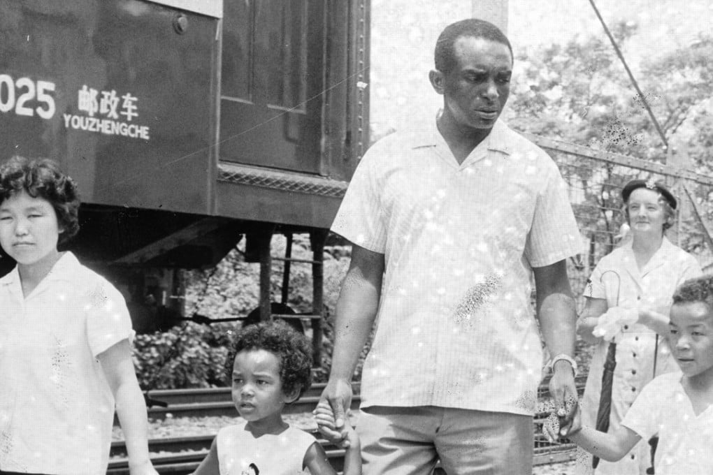 Former US soldier William White and his family crossing the border into Hong Kong at Lo Wu in August 1965.
