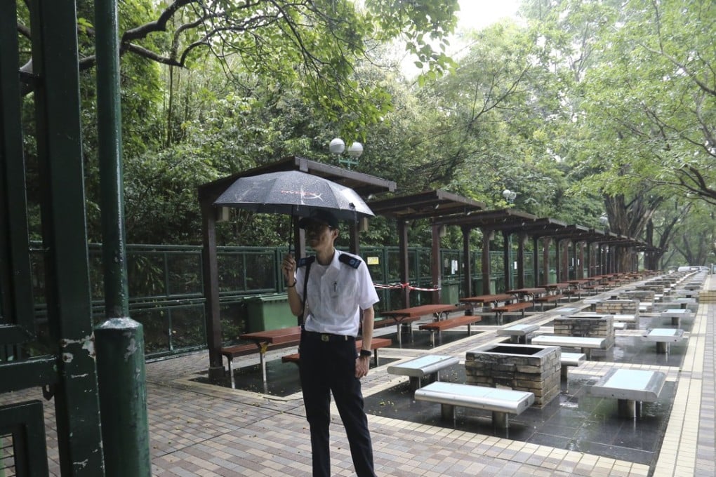 A Food and Environmental Hygiene Department official at a barbecue area of Lion Rock Country Park. Photo: Dickson Lee