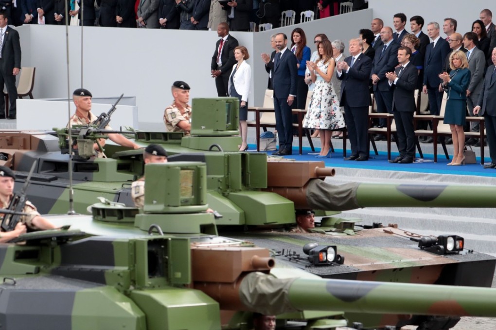 In this file photo taken on July 14, 2017 US President Donald Trump and US First Lady Melania Trump attend a Bastille Day military parade in Paris with French dignitaries including President Emmanuel Macron and Prime Minister Edouard Philippe. The parade inspired Trump to stage a similar event. Photo: Agence France-Presse