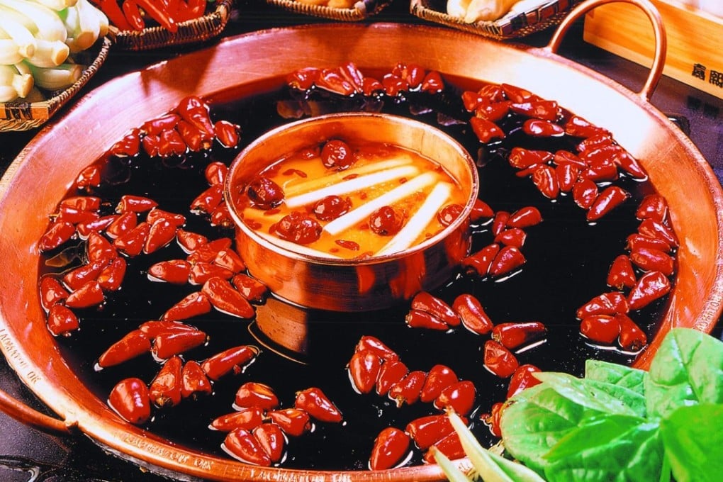 In Chengdu, people spend the most on supper, gathering around tables for hotpot, their evening meal of choice. Photo: SCMP