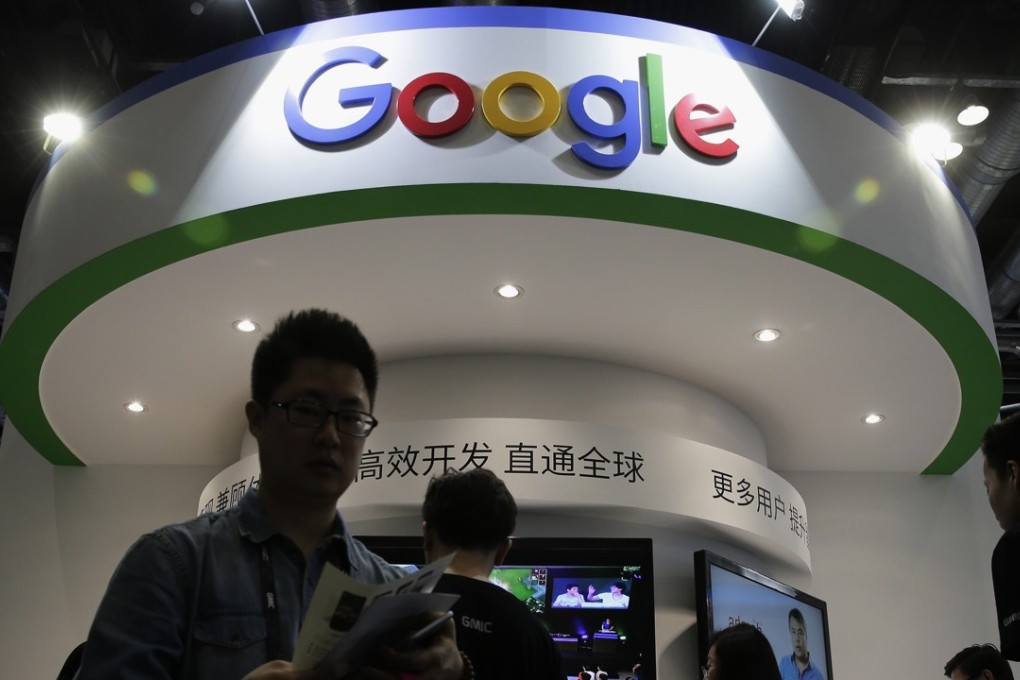 Visitors at a booth for Google at the 2016 Global Mobile Internet Conference in Beijing. Photo: AP