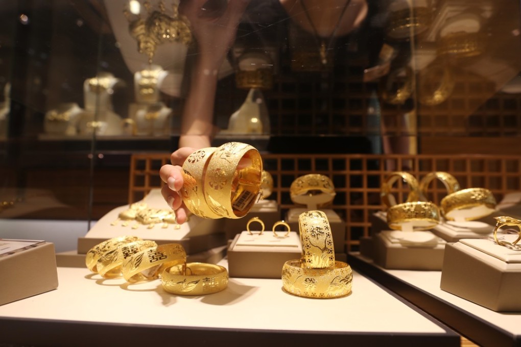 Jewellery is displayed at a shop in Tsim Sha Tsui in July. Gold, the traditional safe haven during market downturns, has not seen substantial inflows. Photo: Winson Wong
