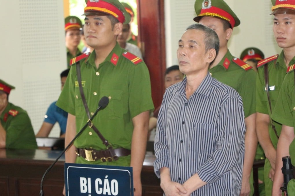 Vietnamese environmental activist Le Dinh Luong during his trial. Photo: Reuters