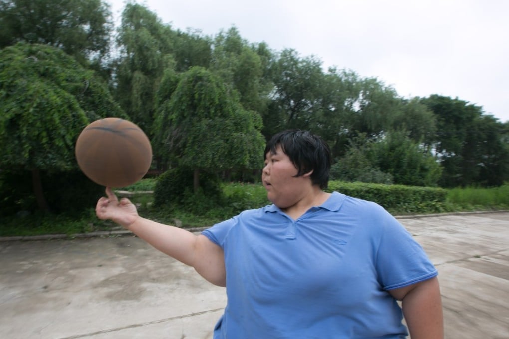After she retired from competitive judo, Guo Chengyan’s weight doubled over nine years to nearly 200kg. Photo: China Foto Press