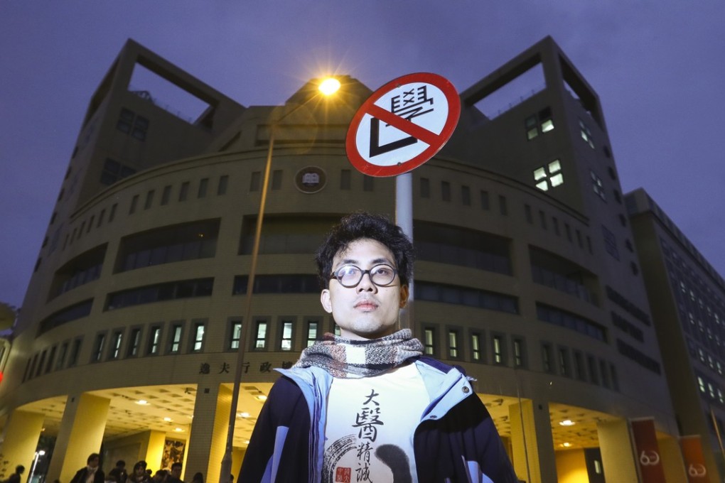 Baptist University Chinese medicine student Andrew Chan was suspended following an eight-hour stand-off over the mandatory Mandarin module. Photo: Nora Tam
