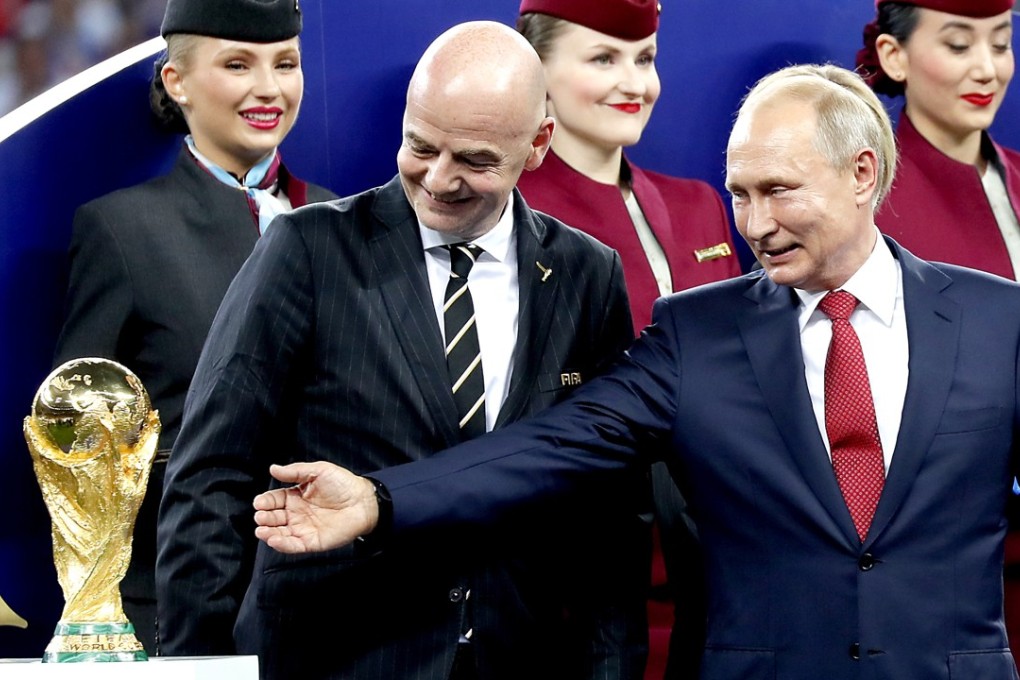 Russian President Vladimir Putin (right) and Fifa president Gianni Infantino admire the World Cup trophy after the 2018 final between France and Croatia in Moscow. Photo: EPA
