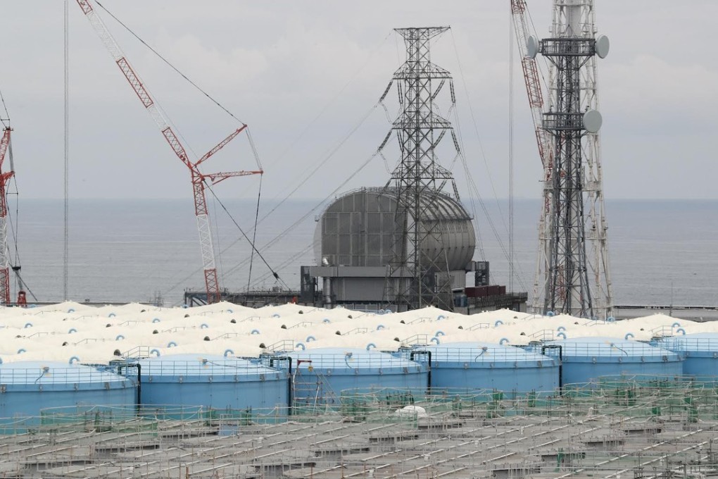 Reactor 3 and tanks storing the radioactive water at the Fukushima Dai-ichi nuclear power plant. Photo: AFP