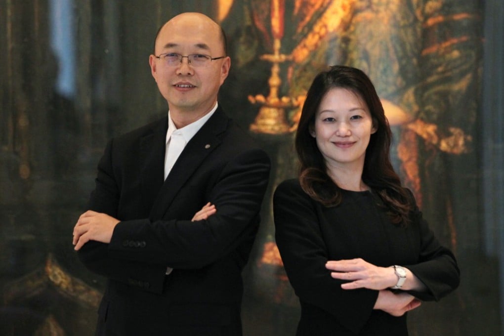 Chang Zhangli (left), chairman of China Shanshui Cement Group with executive director Doris Wu Ling-ling. The company’s new management is taking steps to prevent the company from deslisted. Photo: Roy Issa