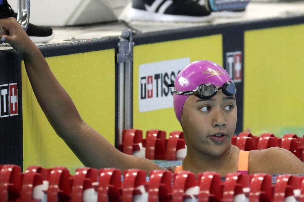 Nepal's Gaurika Singh reacts after her woman's 100m freestyle heat at the 18th Asian Games in Jakarta. Photo: AP