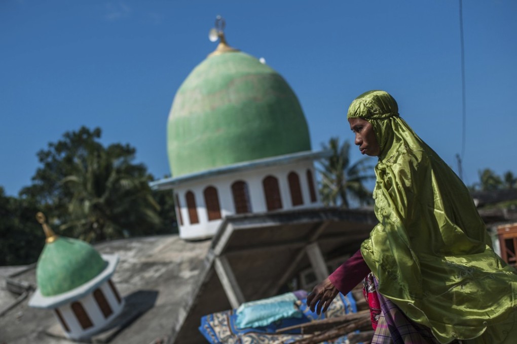 Strong quakes hit the island earlier this month and last month, killing hundreds of people. File photo: AP