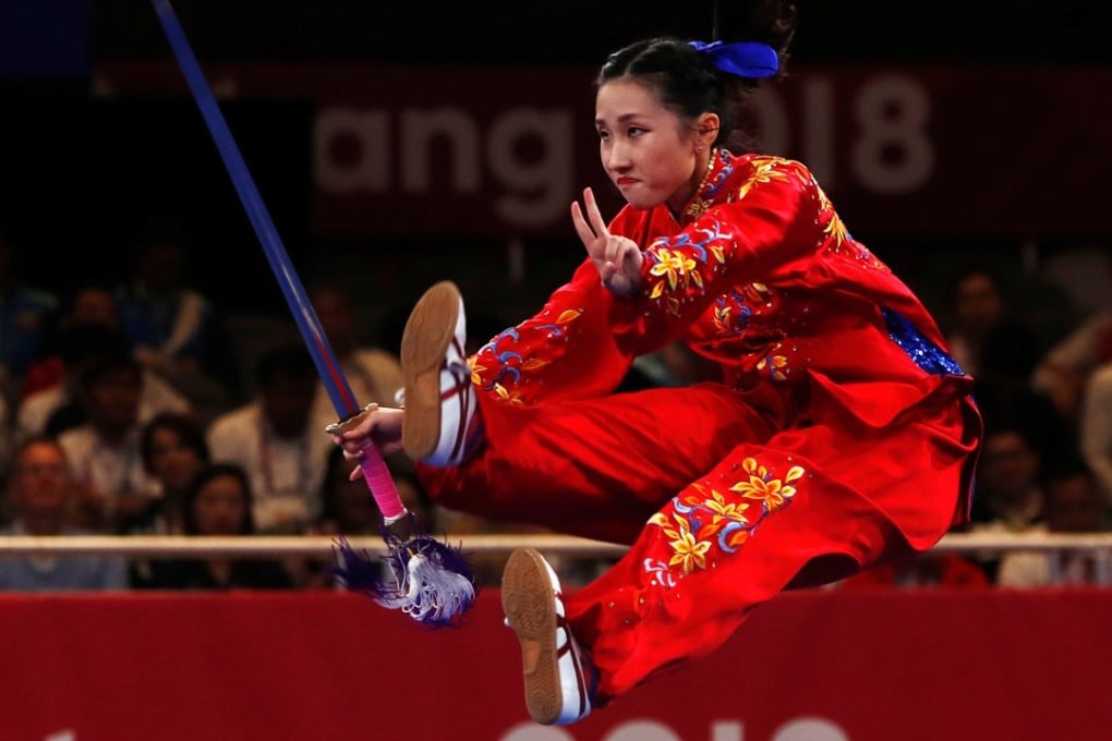 Hong Kong’s Juanita Mok Yuen-ying performs in the Taijijian event. Photo: Reuters