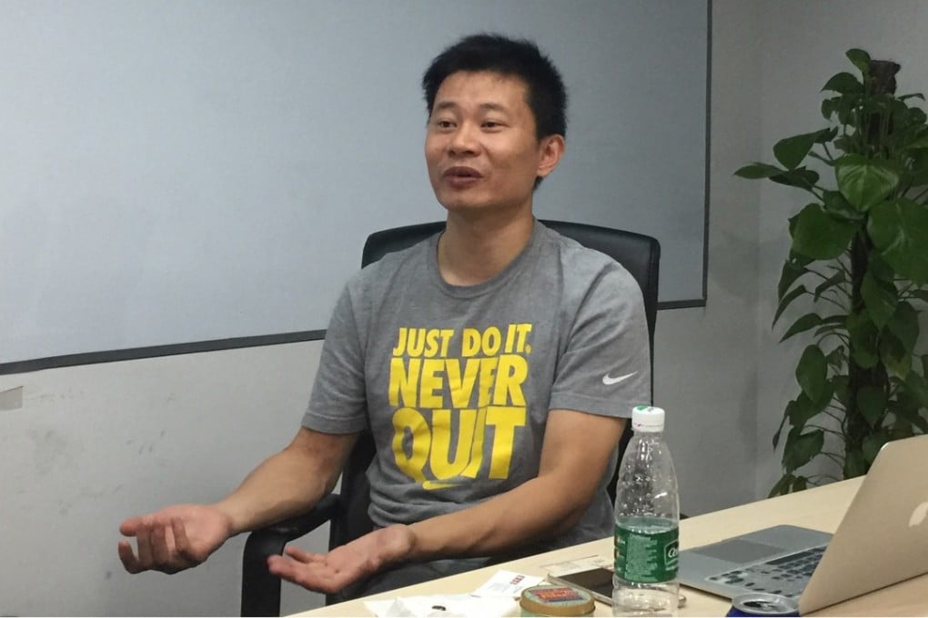 Chen Benfeng, founder and chief executive of Redcore, talks about the company's web browser at its offices in Beijing. Photo: SCMP