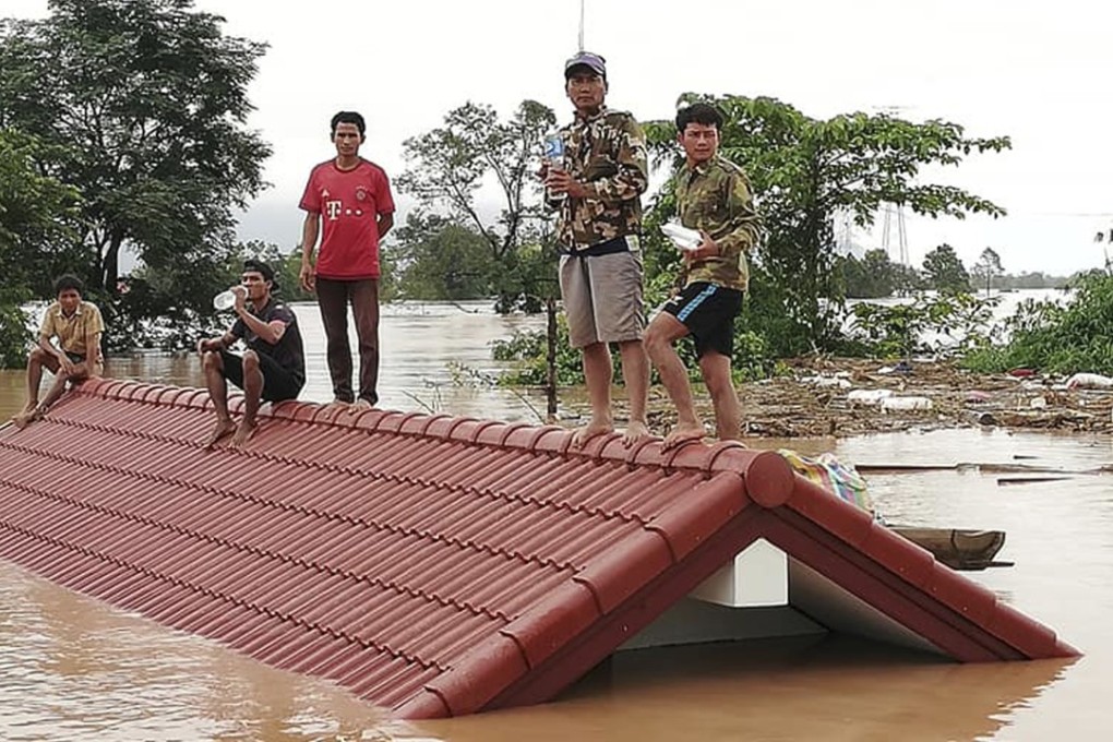 Villagers take refuge after a dam collapsed dam in southeastern Laos. Photo: AP
