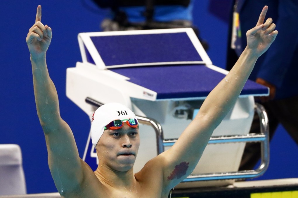 Sun Yang celebrates his 400m freestyle victory in Jakarta. Photo: EPA