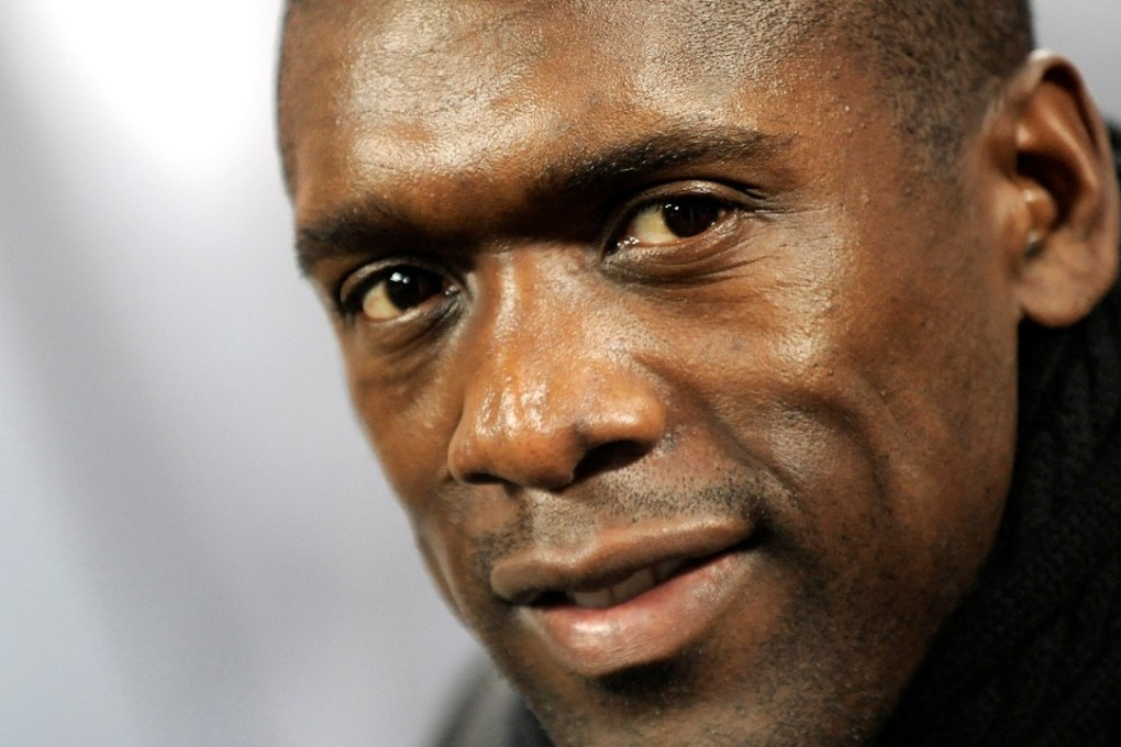 Clarence Seedorf as coach of AC Milan at San Siro Stadium in 2014. Photo: Reuters