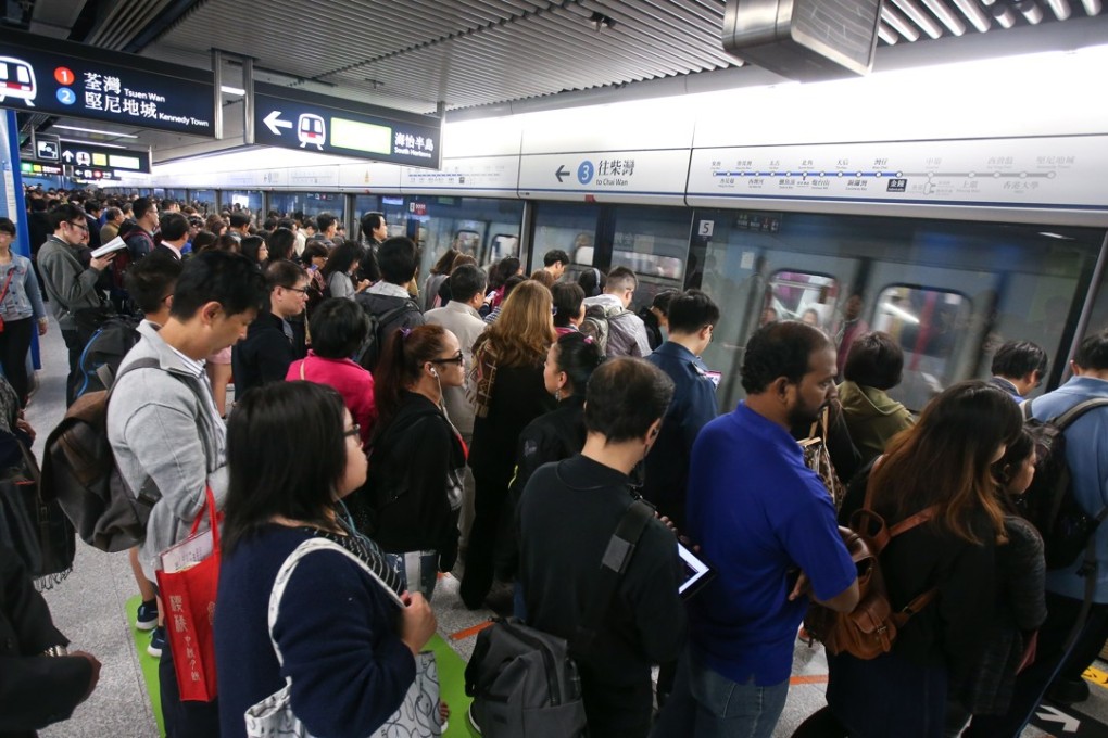 People queue up at Admiralty MTR station. The north shore of Hong Kong Island has limited capacity to absorb more commuters. Photo: David Wong