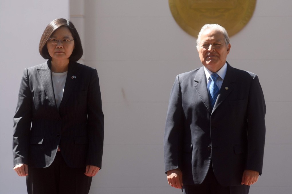 Taiwan President Tsai Ing-wen meets Salvadoran President Salvador Sanchez Ceren last year in San Salvador. Their diplomatic ties were severed on Tuesday. Photo: AFP