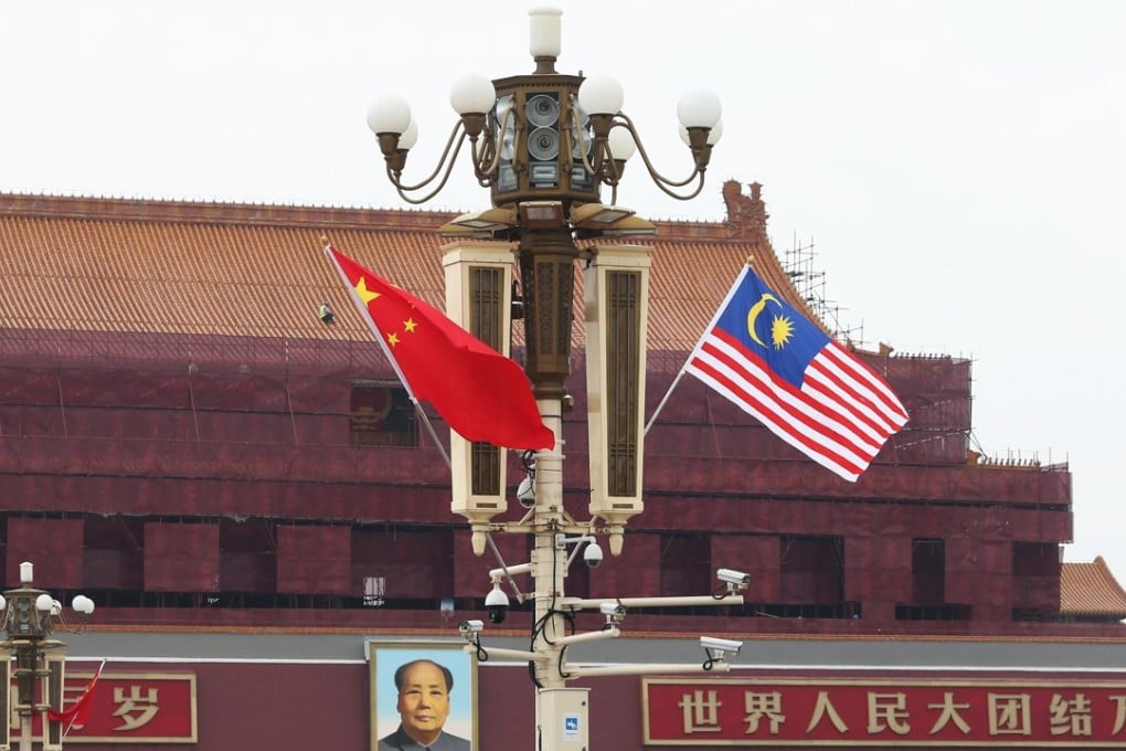 The Chinese and Malaysian flags at Tiananmen Square. Photo: Reuters