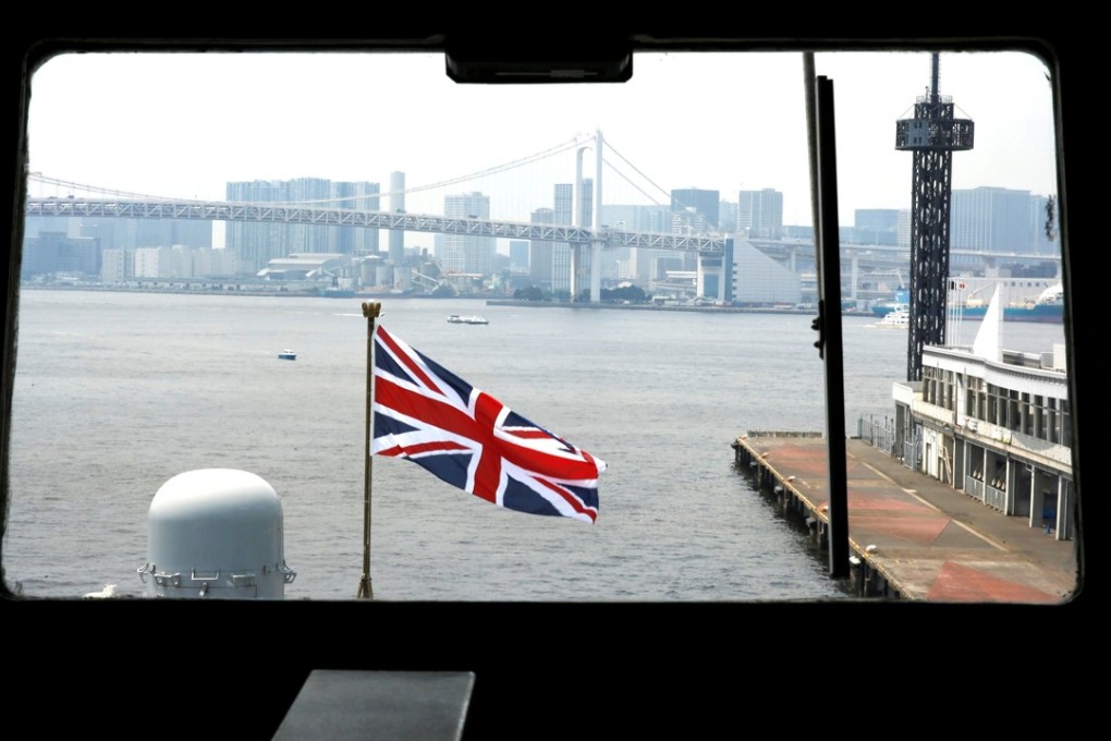 A Union flag is seen from the bridge of HMS Albion after the ship’s arrival at Harumi Pier in Tokyo. Photo: Reuters