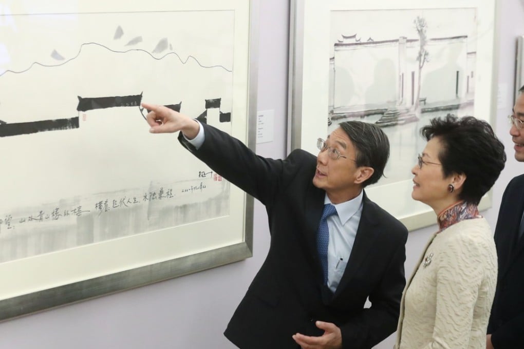 Wu Keyu, son of Wu Guanzhong; Carrie Lam Cheng Yuet-ngor, chief executive of Hong Kong; and Szeto Yuen-kit, the curator of the Hong Kong Museum of Art. Photo: K.Y. Cheng