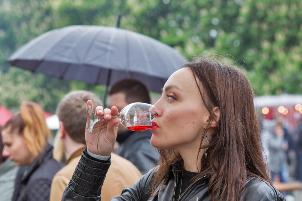 A woman in Ukraine tastes wine at a festival in Kiev. Worldwide, women drink an average of 0.73 units of alcohol per day, with Ukrainian women the biggest drinkers, averaging 4.2 drinks a day, the Global Burden of Disease study found. Photo: Alamy