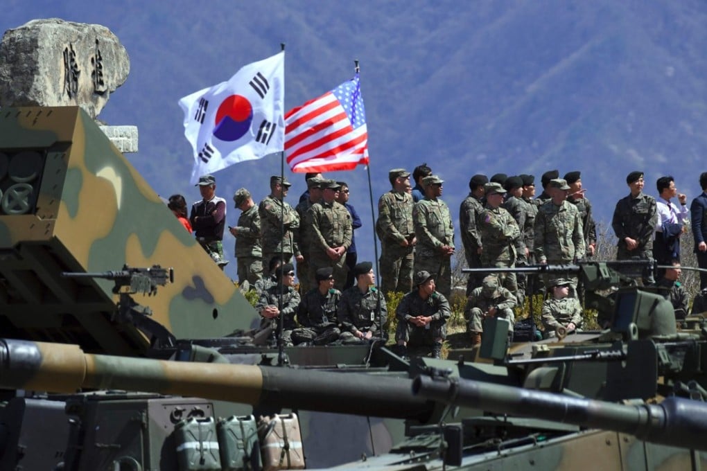South Korean and US soldiers watch a live firing drill during joint exercises in April 2017 in Pocheon, South Korea. Photo: AFP