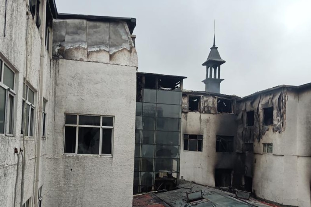 The hotel in Harbin’s Sun Island resort area, after the fire that killed at least 19 people on Saturday. Photo: CNS.