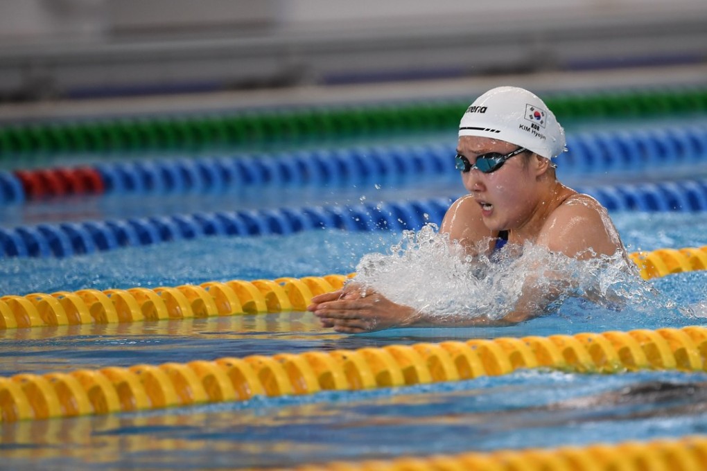 South Korea's Kim Hye-jin competes in a heat of the women's 100m breaststroke swimming event during the 2018 Asian Games. Photo: AFP