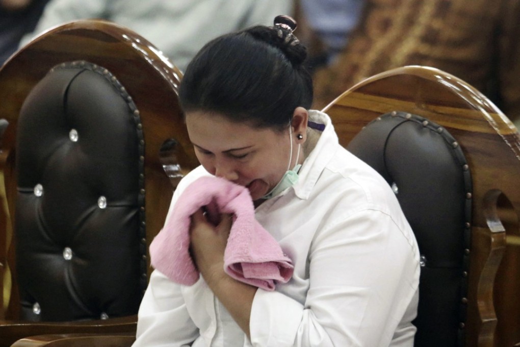 Meiliana weeps during her sentencing. Photo: AP