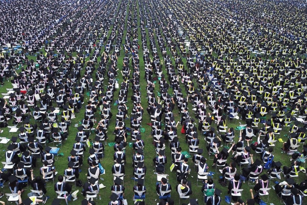 Thousands of undergraduates attend the 2018 graduation ceremony of Wuhan University in central China's Hubei province, 22 June 2018. Photo: Imaginechina