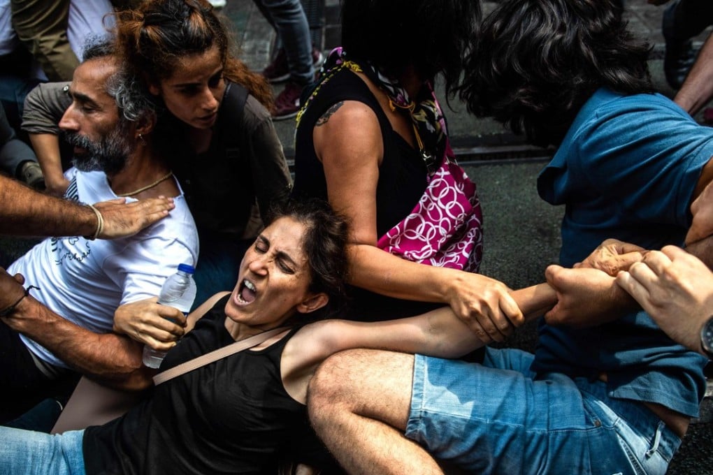 Turkish riot police on Saturday breaking up the 700th weekly demonstration by Turkish mothers demanding to know the fate of relatives who disappeared in the 1980s and 1990s. Photo: AFP