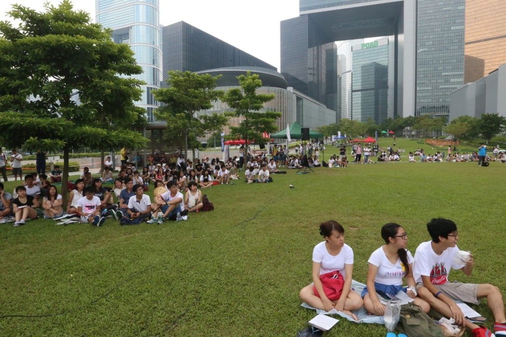 Students sit in Tamar Park outside Hong Kong’s legislature. Photo: K.Y. Cheng