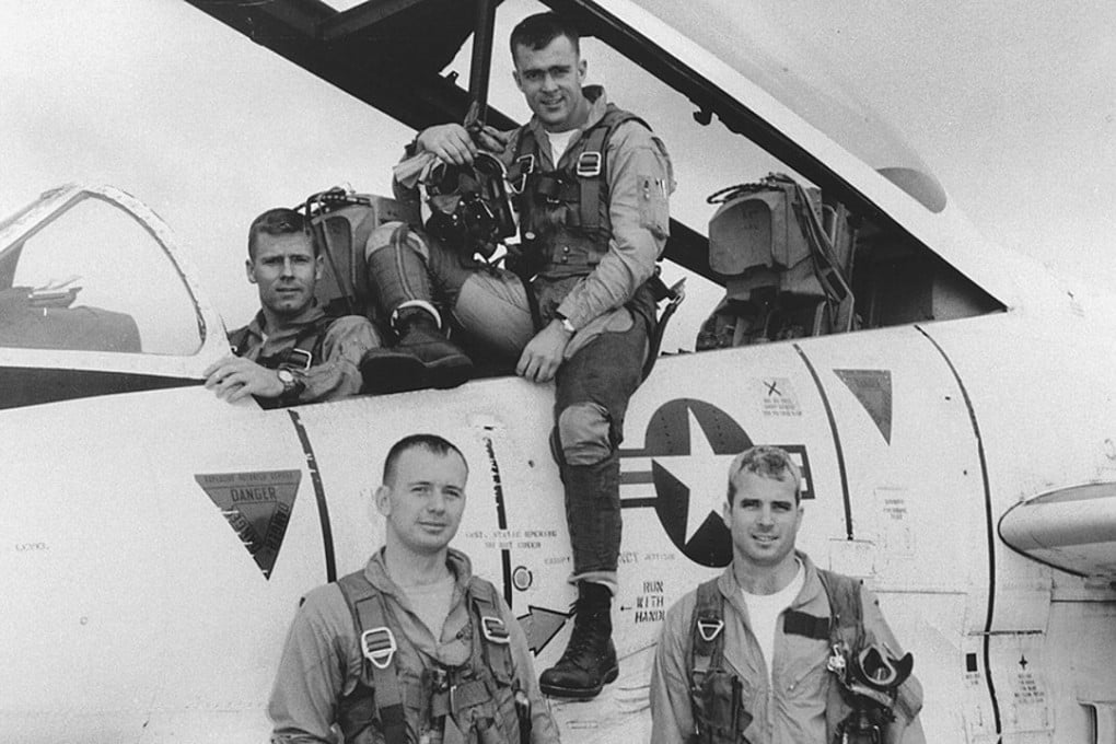 John McCain (lower right) poses with his US Navy squadron during flight training in 1965. File photo: EPA