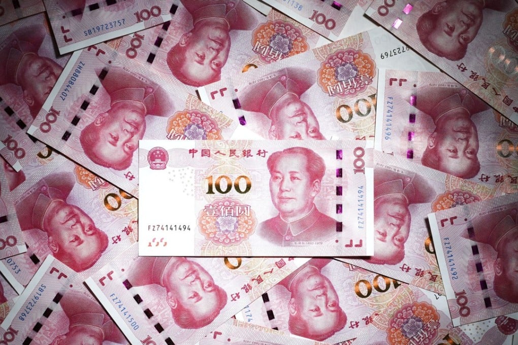 The yuan has slid against the US dollar this year. Photo: Kyodo