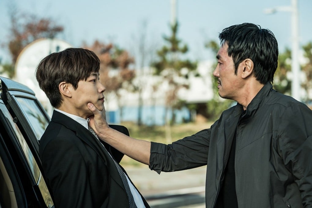 Cho Jin-woong gets to grips with Ryu Jun-yeol in a scene from Believer (category: IIB; Korean), directed by Lee Hae-yeong and also starring Kim Joo-hyuk.