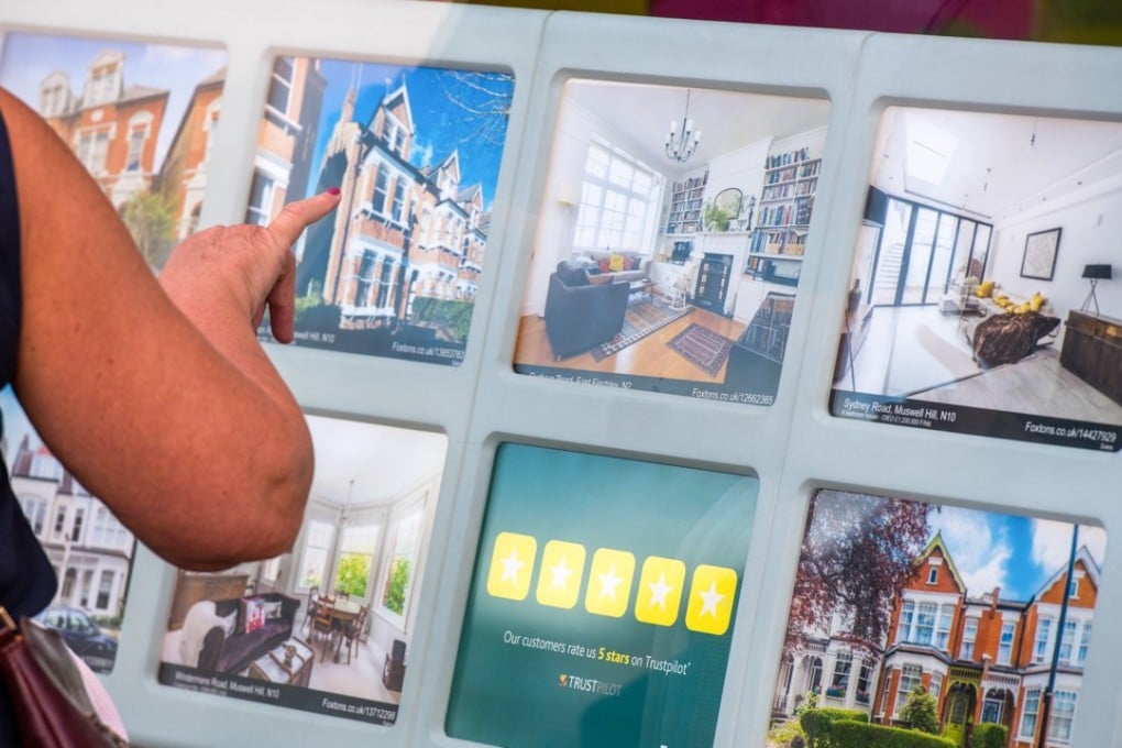 Residential property on display at an estate agent in London. Mortgage lending in the UK fell in July ahead of an interest rate rise by the Bank of England. Photo: Bloomberg