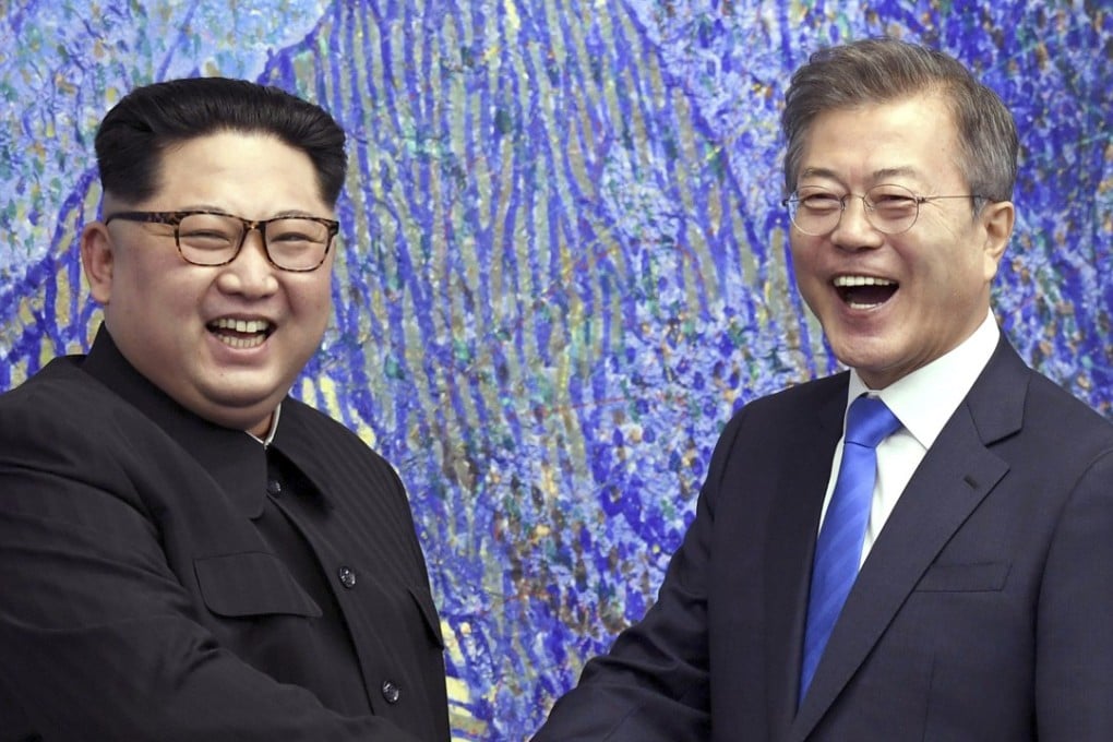 North Korean leader Kim Jong-un with South Korean President Moon Jae-in at the border village of Panmunjom in the Demilitarised Zone. Photo: AP