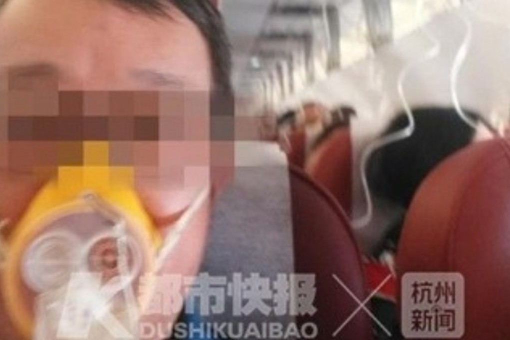 A passenger on the Capital Airlines flight from Kunming to Hangzhou during the mid-air scare. Photo: Sina.Com.cn