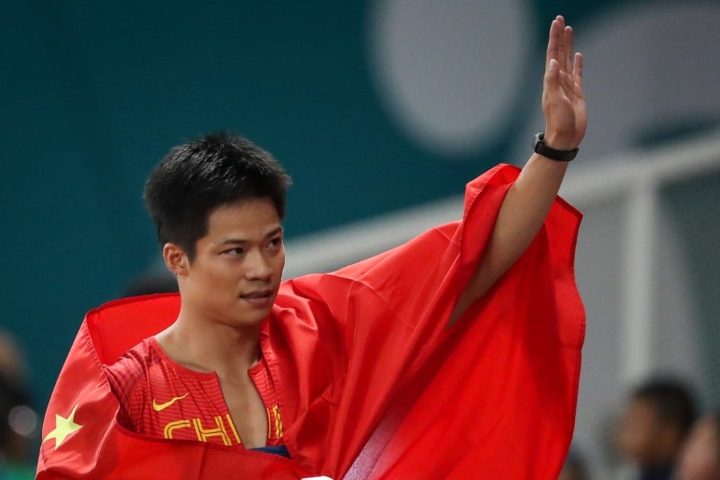 Su Bingtian of China reacts after finishing first in the men’s 100m final at the Asian Games in Jakarta. Photo: EPA