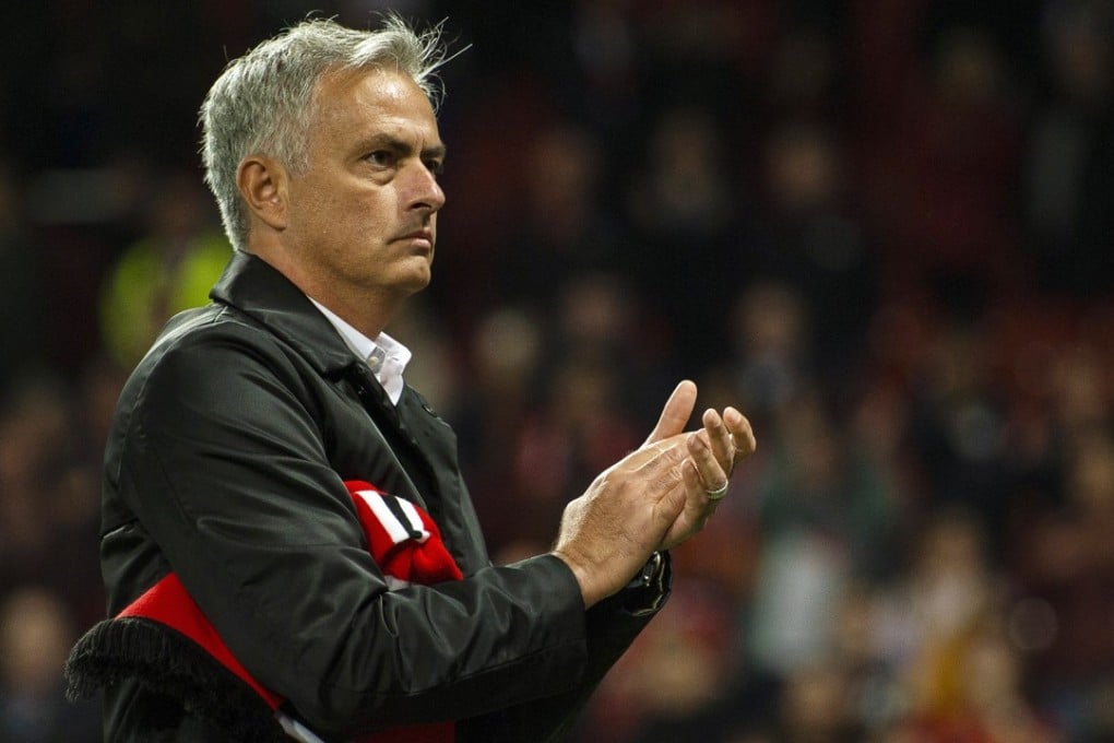 Manchester United manager Jose Mourinho applauds the crowd after the English Premier League loss toTottenham at the Old Trafford. Photo: EPA