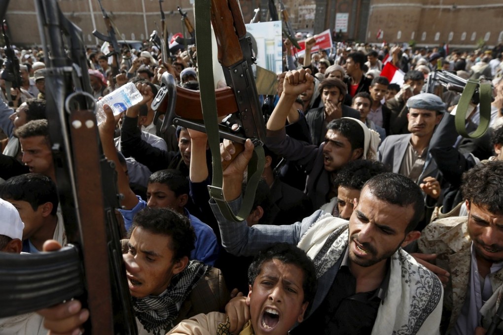 Armed Houthis in Sanaa. Photo: Reuters