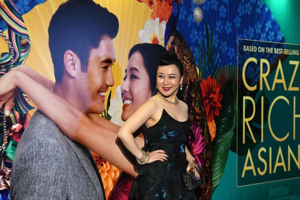 Chinese jazz singer Jasmine Chen, who performed in the film, poses at the premiere of the film Crazy Rich Asians at Capitol Theatre in Singapore on August 21. Will the film’s portrayal of Asia’s ultra rich leave the audience with the wrong impression that all Asians are rich and live fanciful lives? Photo: AFP