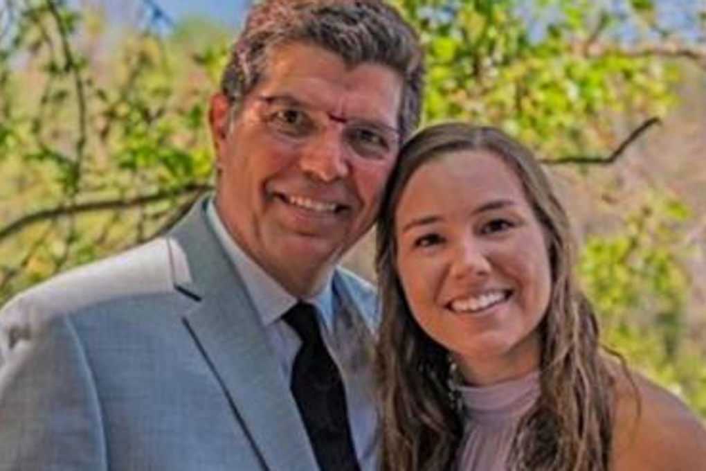 Rob Tibbetts with daughter Mollie in a family photo. The body of 20-year-old Mollie was found on August 21 in a cornfield outside Brooklyn, Iowa. Photo: Supplied