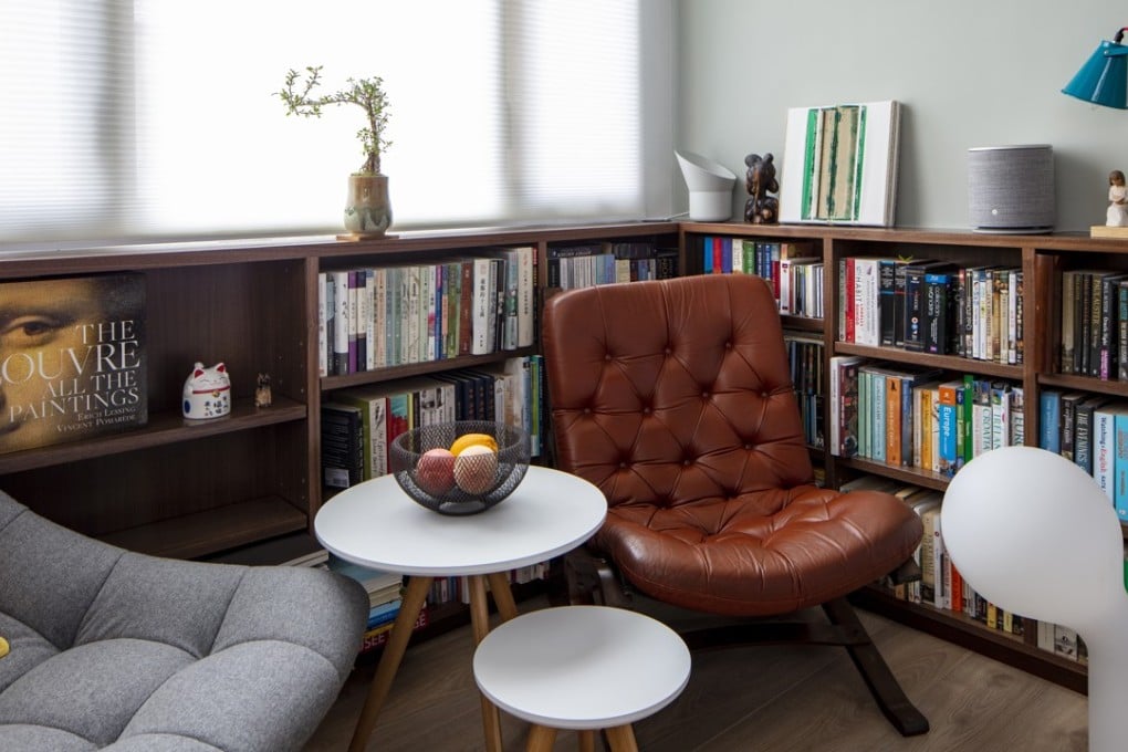 Softly curved designer furniture and clever storage help this small apartment feel bigger than its 300 sq ft. Photography and video: John Butlin. Styling: David Roden