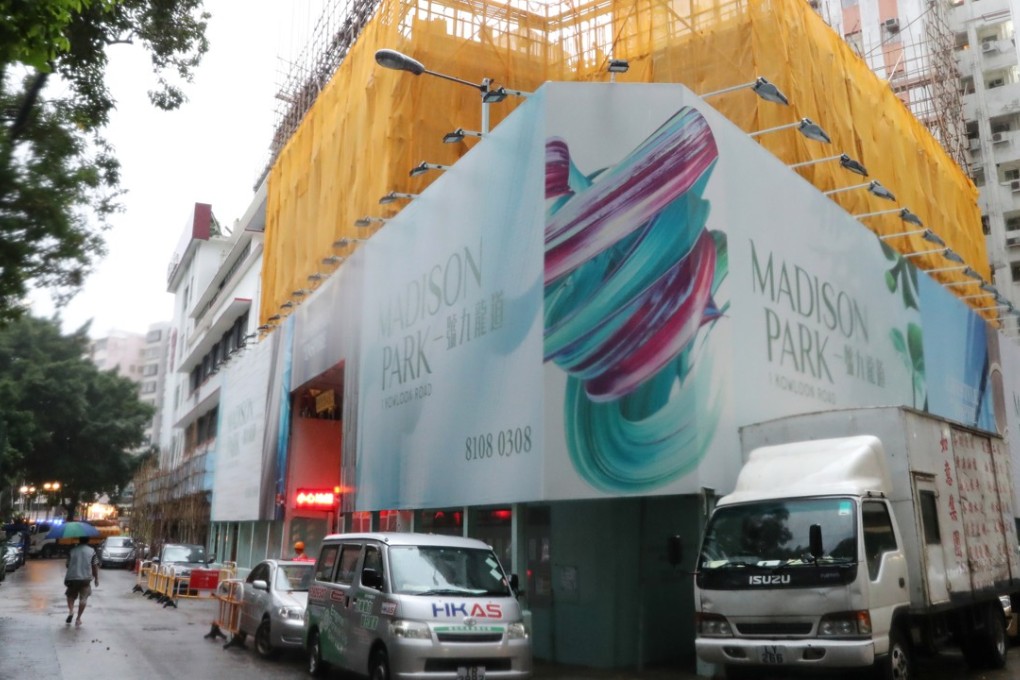 The advertising hoarding around Madison Park in Sham Shui Po. Photo: SCMP