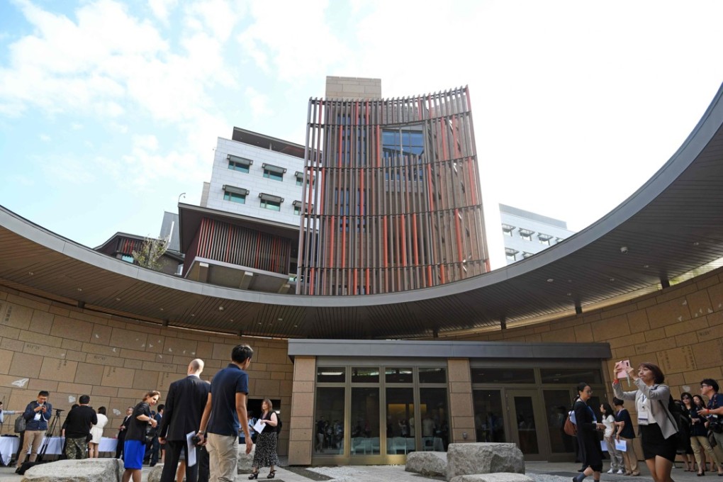 Journalists tour the new office complex of the American Institute in Taiwan (AIT) during a dedication ceremony in Taipei on June 12, 2018. US personnel will be deployed there to serve as security guards. Photo: AFP