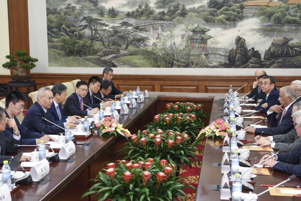 Chinese Vice Premier Liu He meets members of the international advisory committee of China Investment Corporation in Beijing on Tuesday. Photo: Xinhua