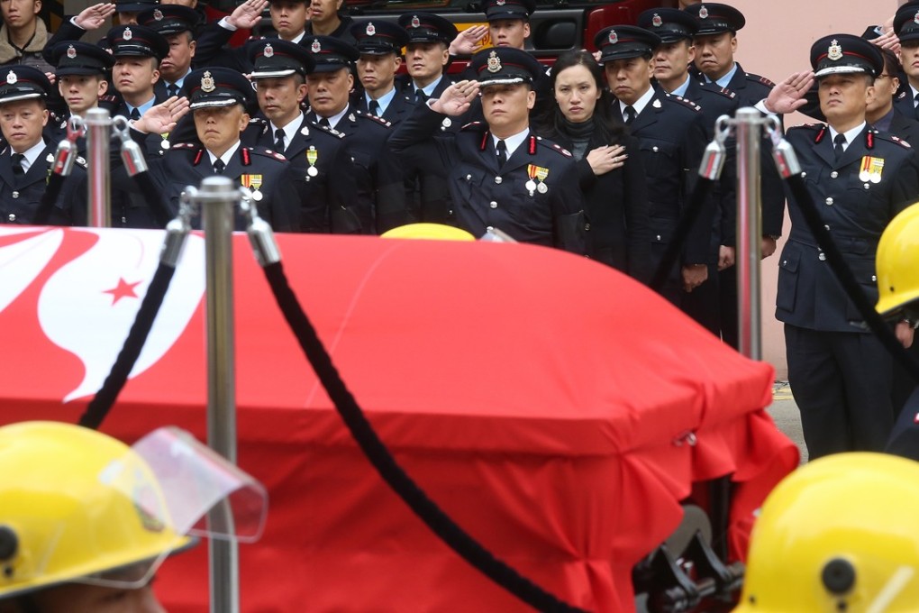 Colleagues bid farewell at the funeral service of fireman Leung Kwok-kei in 2014. Photo: K. Y. Cheng